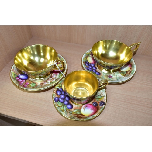 379 - TWO AYNSLEY FRUIT DECORATED TEA CUPS AND SAUCERS SIGNED D.JONES AND A COFFEE CUP AND SAUCER SIGNED N... 