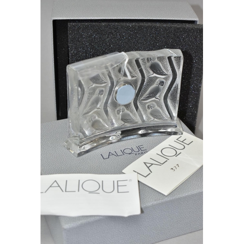 381 - A BOXED MODERN LALIQUE 'CLOCK HULOTTE', the curved glass case moulded with owls, the quartz movement... 