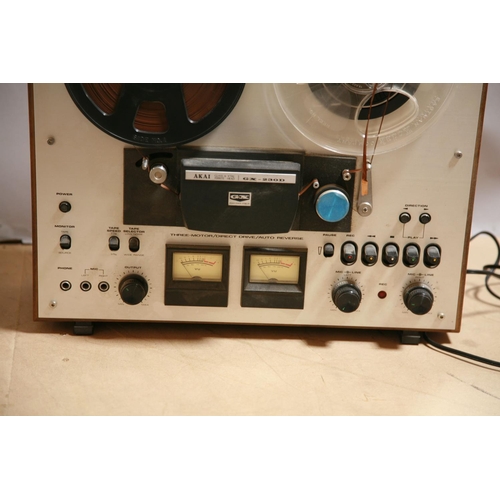 924 - AN AKAI GX-230D REEL TO REEL RECORDER with two boxes of tape reels, ( untested due to no plug)