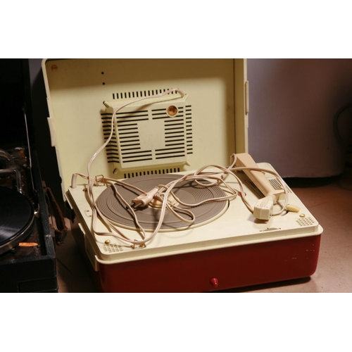 929 - A HMV TABLE TOP WIND UP GRAMAPHONE  with black covering, a Philips record player with red and cream ... 