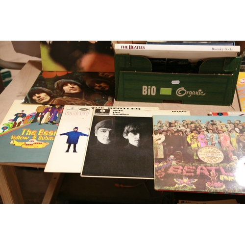 934 - A TRAY CONTAINING LPs AND BOOKS OF AND BY THE BEATLES including Help ( 1st pressing), With The Beatl... 