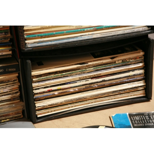 937 - FIVE RECORD CASES CONTAINING OVER ONE HUNDRED AND FORTY LPs, 12in SINGLES AND A CD BOXSET by Bob Dyl... 