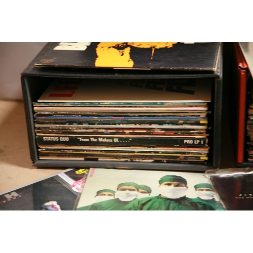 942 - TWO RECORD CASES CONTAINING OVER SIXTY LPs OF ROCK MUSIC including WWA copies of Vol.4 and Master of... 