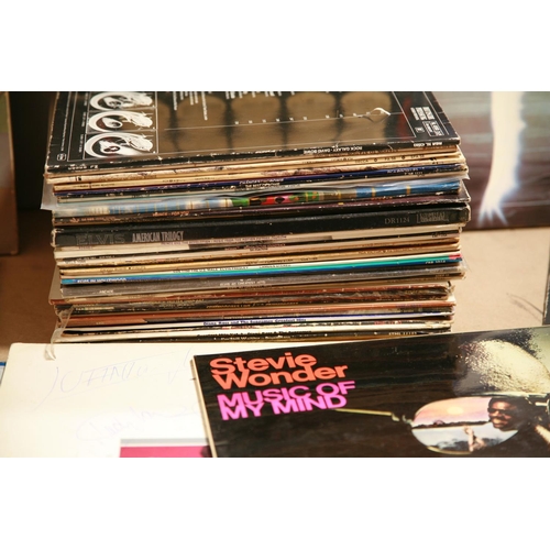 943 - A TRAY CONTAINING OVER FIFTY LPs AND 12in SINGLES by Elvis Presley, Prince, David Bowie, Tarkus, Han... 