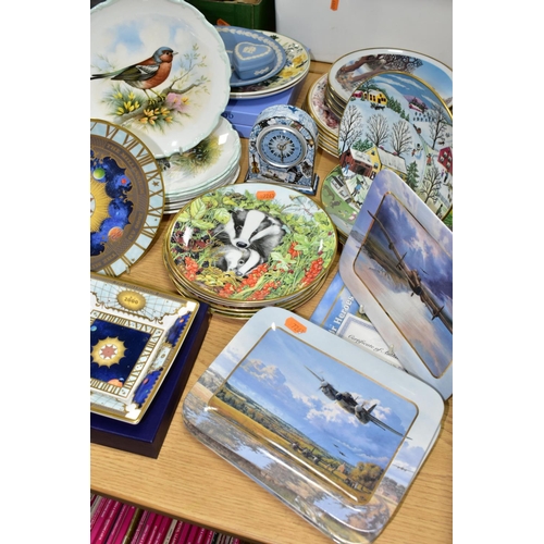 399 - A QUANTITY OF COLLECTABLE PLATES, comprising four plates in the A Land Fit For Heroes series 'Safely... 