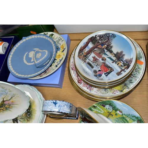 399 - A QUANTITY OF COLLECTABLE PLATES, comprising four plates in the A Land Fit For Heroes series 'Safely... 