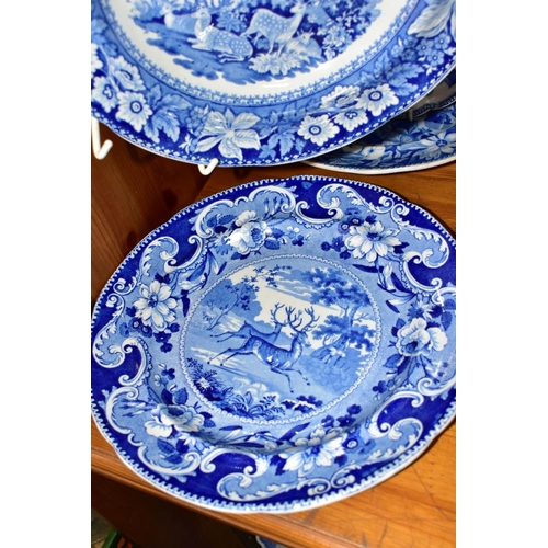 406 - FOUR NINETEENTH CENTURY BLUE AND WHITE PLATES PRINTED WITH DEER, one with impressed 'Enoch Wood & So... 