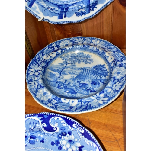 406 - FOUR NINETEENTH CENTURY BLUE AND WHITE PLATES PRINTED WITH DEER, one with impressed 'Enoch Wood & So... 