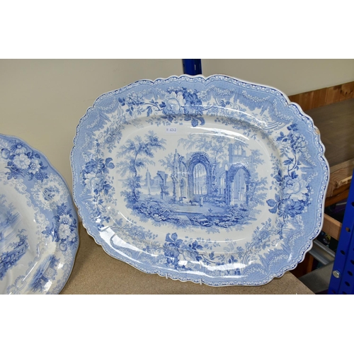 415 - TWO 19TH CENTURY RECTANGULAR FORM BLUE AND WHITE MEAT PLATES, comprising one decorated with a scene ... 