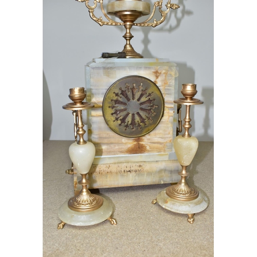 417 - A LATE 19TH CENTURY FRENCH MARBLE CLOCK GARNITURE with  key, a cream enamel dial marked Comptoir Gen... 