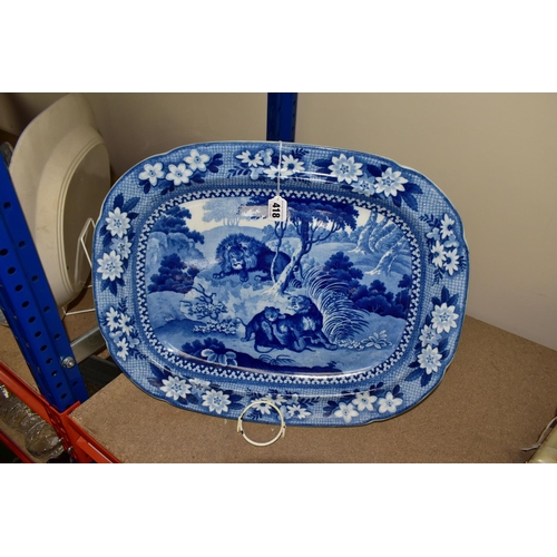 418 - AN ADAMS BLUE AND WHITE PEARLWARE MEAT PLATE, embossed 18 on the back, decorated with a savannah sce... 