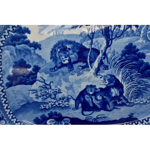 418 - AN ADAMS BLUE AND WHITE PEARLWARE MEAT PLATE, embossed 18 on the back, decorated with a savannah sce... 