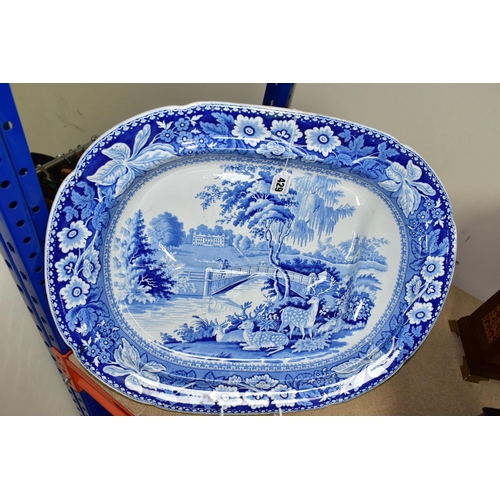 429 - A LARGE BLUE AND WHITE  PLATTER, decorated with a pastoral scene, Fallow deer in foreground, length ... 