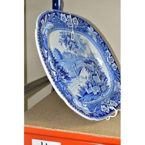 429 - A LARGE BLUE AND WHITE  PLATTER, decorated with a pastoral scene, Fallow deer in foreground, length ... 