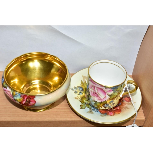 447 - AN AYNSLEY FLORAL DECORATED COFFEE CAN, SAUCER AND SUGAR BOWL BY J. A. BAILEY, the sugar bowl of sho... 