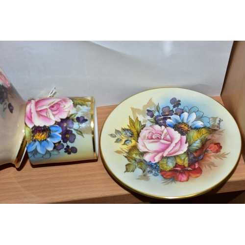 447 - AN AYNSLEY FLORAL DECORATED COFFEE CAN, SAUCER AND SUGAR BOWL BY J. A. BAILEY, the sugar bowl of sho... 