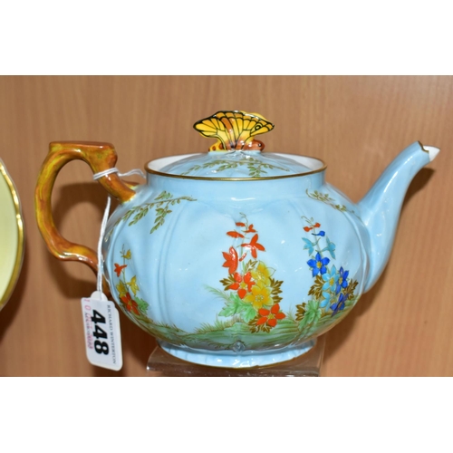 448 - AN AYNSLEY TEAPOT WITH BUTTERFLY FINIAL, AND MATCHING TRIO, pattern B153, teapot and cup with relief... 