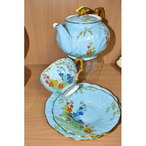 448 - AN AYNSLEY TEAPOT WITH BUTTERFLY FINIAL, AND MATCHING TRIO, pattern B153, teapot and cup with relief... 