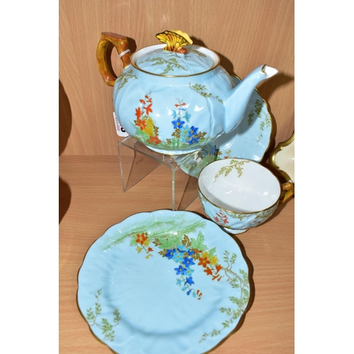 448 - AN AYNSLEY TEAPOT WITH BUTTERFLY FINIAL, AND MATCHING TRIO, pattern B153, teapot and cup with relief... 