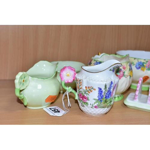 457 - A GROUP OF AYNSLEY TEA AND BREAKFAST WARES, comprising a butterfly handled cream jug printed in Hydr... 