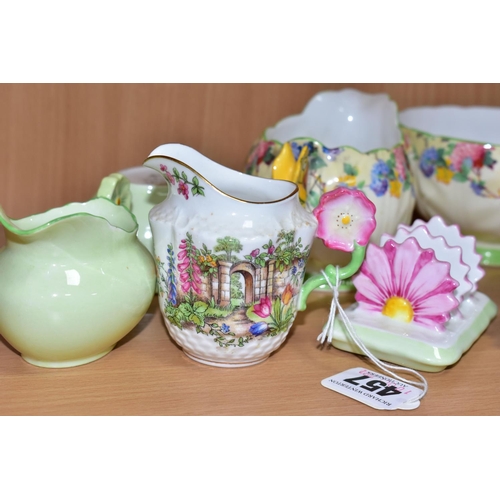 457 - A GROUP OF AYNSLEY TEA AND BREAKFAST WARES, comprising a butterfly handled cream jug printed in Hydr... 