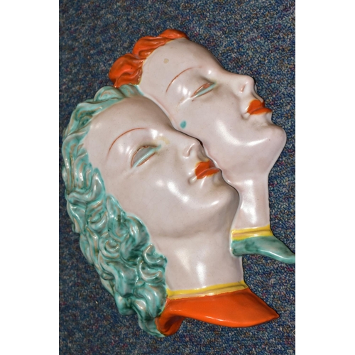 458 - A GOLDSCHEIDER POTTERY DOUBLE WALL MASK, in the form of two ladies with orange or green hair, printe... 