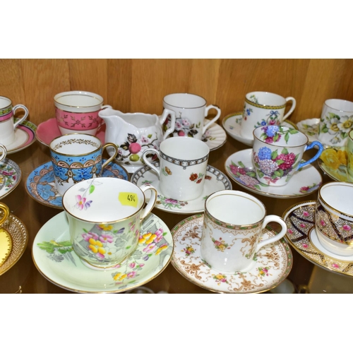 494 - A COLLECTION OF TWENTY FOUR AYNSLEY COFFEE CANS / CUPS AND SAUCERS AND A CREAM JUG, assorted pattern... 