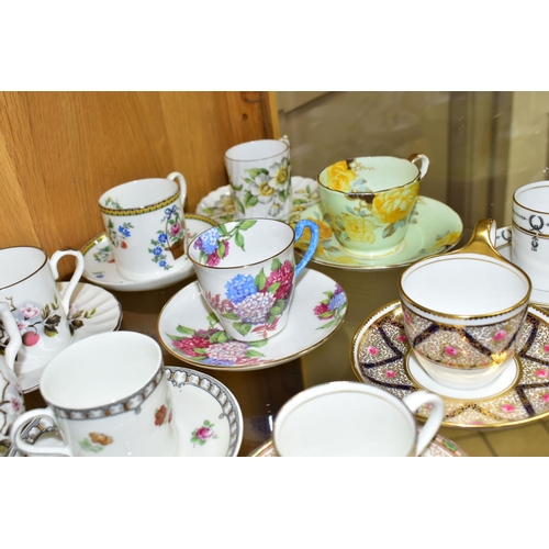 494 - A COLLECTION OF TWENTY FOUR AYNSLEY COFFEE CANS / CUPS AND SAUCERS AND A CREAM JUG, assorted pattern... 