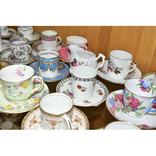 494 - A COLLECTION OF TWENTY FOUR AYNSLEY COFFEE CANS / CUPS AND SAUCERS AND A CREAM JUG, assorted pattern... 