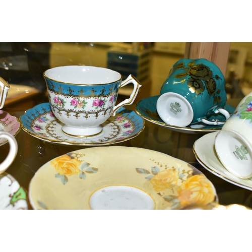 531 - EIGHTEEN AYNSLEY TEA CUPS AND SAUCERS, patterns to include 'The Nelros Cup of Fortune', 'The Cup of ... 