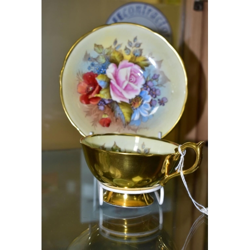 538 - AN AYNSLEY FLORAL DECORATED TEA CUP AND SAUCER BY J. A. BAILEY, with wavy rims, cup having gilt exte... 