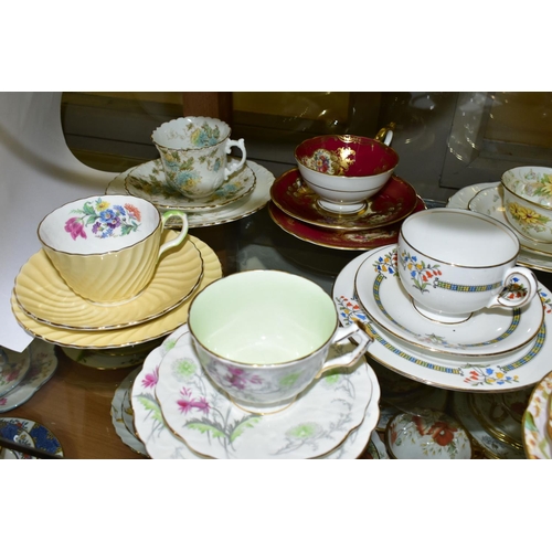 542 - TWELVE AYNSLEY TRIOS, including antique and vintage china, floral patterns in different styles to in... 