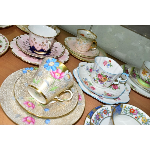 543 - TWELVE AYNSLEY TRIOS, including antique and vintage china, mainly floral patterns in different style... 