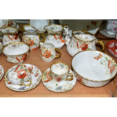 544 - AN AYNSLEY POPPY FORTY NINE PIECE TEA SET, comprising a teapot, a cake plate, a slop bowl, four diff... 