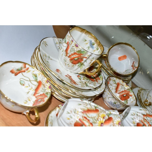 544 - AN AYNSLEY POPPY FORTY NINE PIECE TEA SET, comprising a teapot, a cake plate, a slop bowl, four diff... 