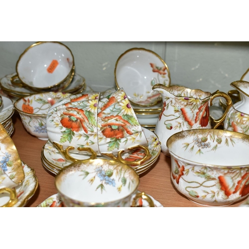 544 - AN AYNSLEY POPPY FORTY NINE PIECE TEA SET, comprising a teapot, a cake plate, a slop bowl, four diff... 