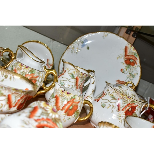 544 - AN AYNSLEY POPPY FORTY NINE PIECE TEA SET, comprising a teapot, a cake plate, a slop bowl, four diff... 