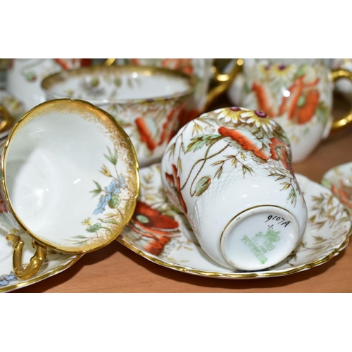 544 - AN AYNSLEY POPPY FORTY NINE PIECE TEA SET, comprising a teapot, a cake plate, a slop bowl, four diff... 