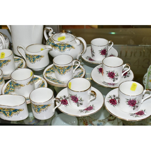 548 - THREE AYNSLEY PART COFFEE SETS comprising a coffee pot, covered sugar bowl, cream jug, six coffee ca... 