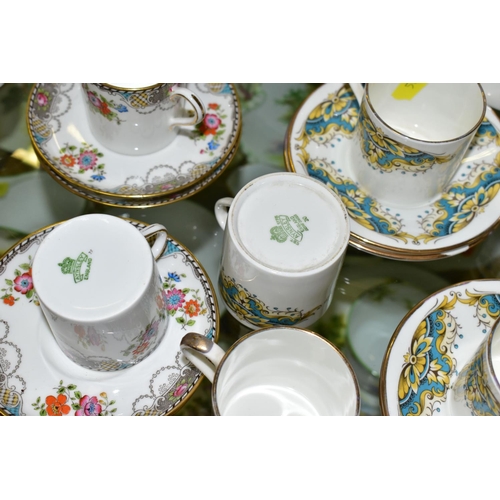 548 - THREE AYNSLEY PART COFFEE SETS comprising a coffee pot, covered sugar bowl, cream jug, six coffee ca... 