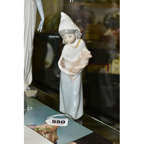 550 - A GROUP OF SEVEN LLADRO FIGURINES  TOGETHER WITH A LLADRO CATALOGUE, comprising a 2000/2001 edition ... 