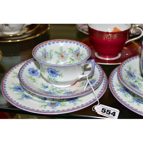 554 - A GROUP OF AYNSLEY TRIOS  AND SOUP BOWLS,  comprising two soup bowls with two saucers in the 'Queen'... 