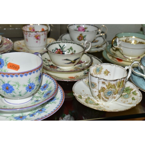 554 - A GROUP OF AYNSLEY TRIOS  AND SOUP BOWLS,  comprising two soup bowls with two saucers in the 'Queen'... 