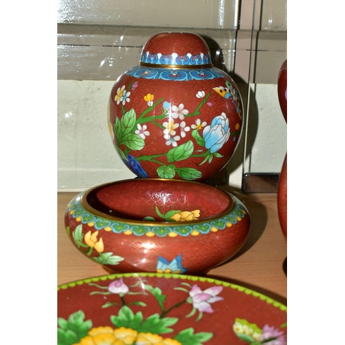 556 - A COLLECTION OF MODERN CLOISONNÉ comprising four vases on wooden stands, a ginger jar, dish, bowl an... 