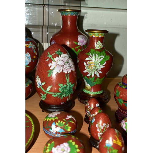 556 - A COLLECTION OF MODERN CLOISONNÉ comprising four vases on wooden stands, a ginger jar, dish, bowl an... 