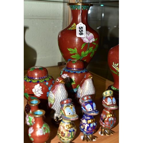 556 - A COLLECTION OF MODERN CLOISONNÉ comprising four vases on wooden stands, a ginger jar, dish, bowl an... 