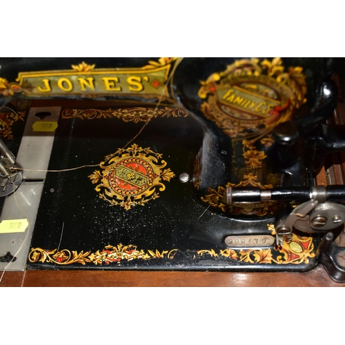 559 - AN EDWARDIAN JONES SEWING MACHINE, with a wooden carry case, model No. 288479 as supplied to her Maj... 