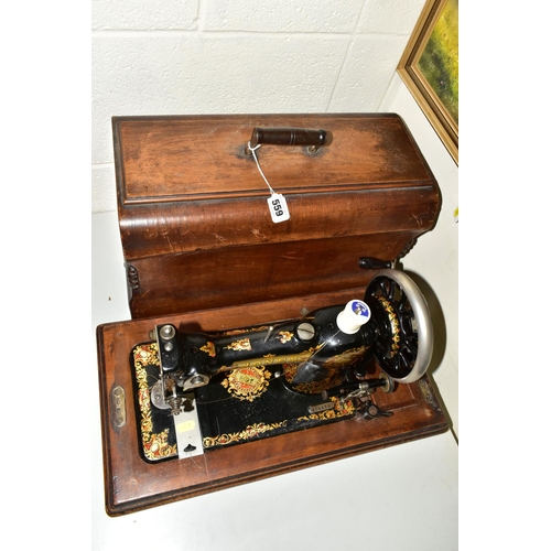 559 - AN EDWARDIAN JONES SEWING MACHINE, with a wooden carry case, model No. 288479 as supplied to her Maj... 