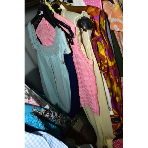 570 - A COLLECTION OF VINTAGE LADIES CLOTHING INCORPORATING STYLES FROM THE 1960'S AND 1970'S, comprising ... 