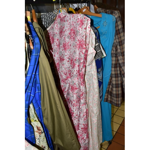 571 - A RAIL OF THIRTY TWO ITEMS OF ASSORTED VINTAGE CLOTHING comprising a gentleman's original Harris twe... 